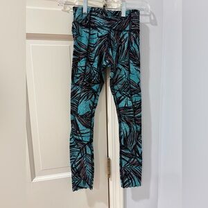 Lululemon sz 2 green and pink palm pattern leggings.